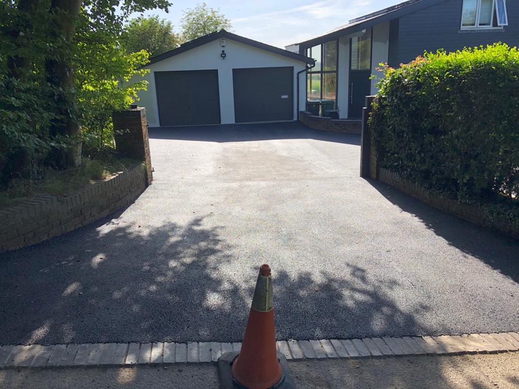 This is a photo of a bitumen driveway which is in the process of being installed by Geelong Road Tech